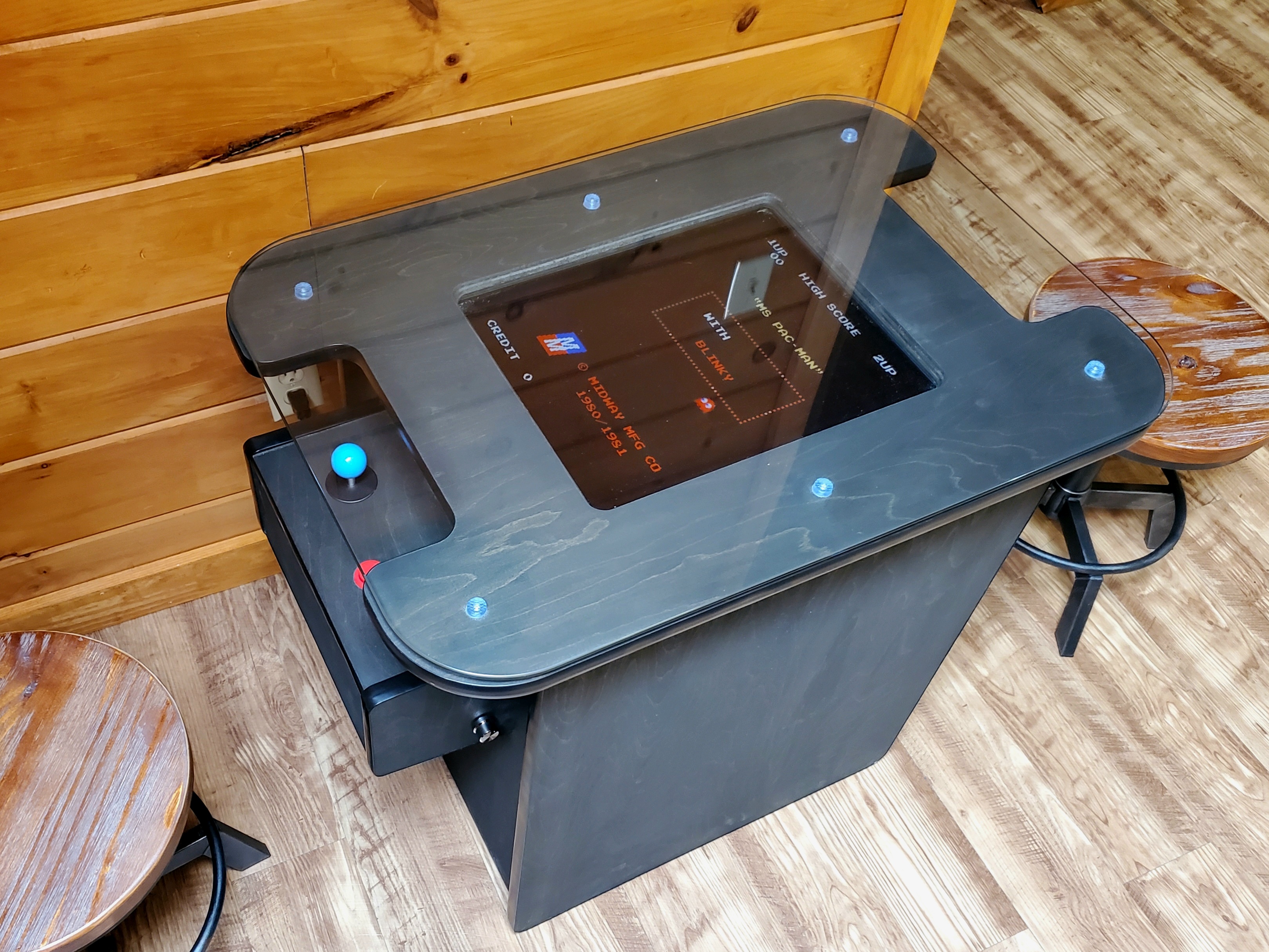 Arcade table with more than 400 classic video arcade games.